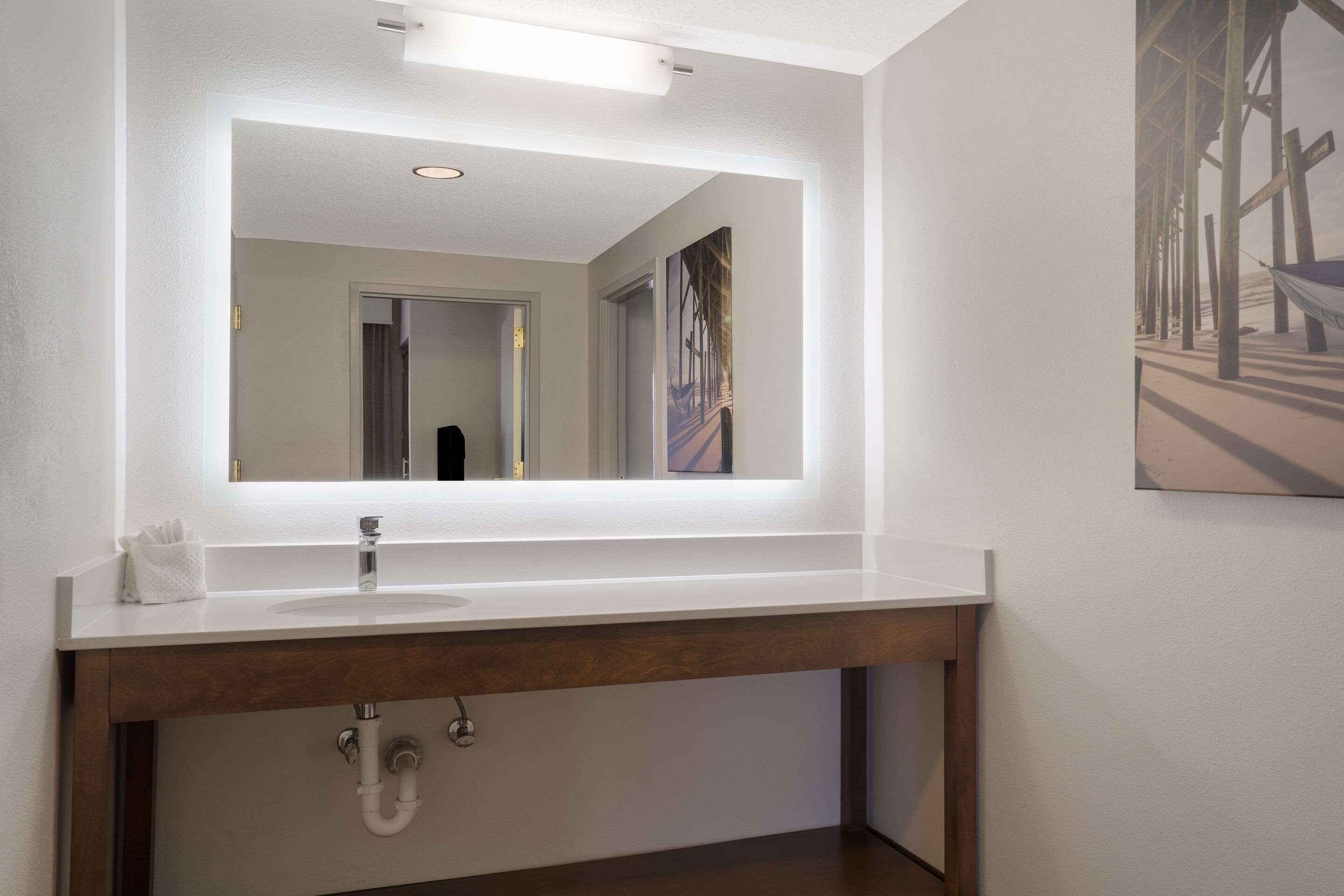 premium bedding, desk, laptop workspace, blackout curtains