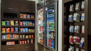 A snack and beverage display area with various packaged snacks and drinks. - Residence Inn by Marriott Houston Downtown/Convention Center (Houston)