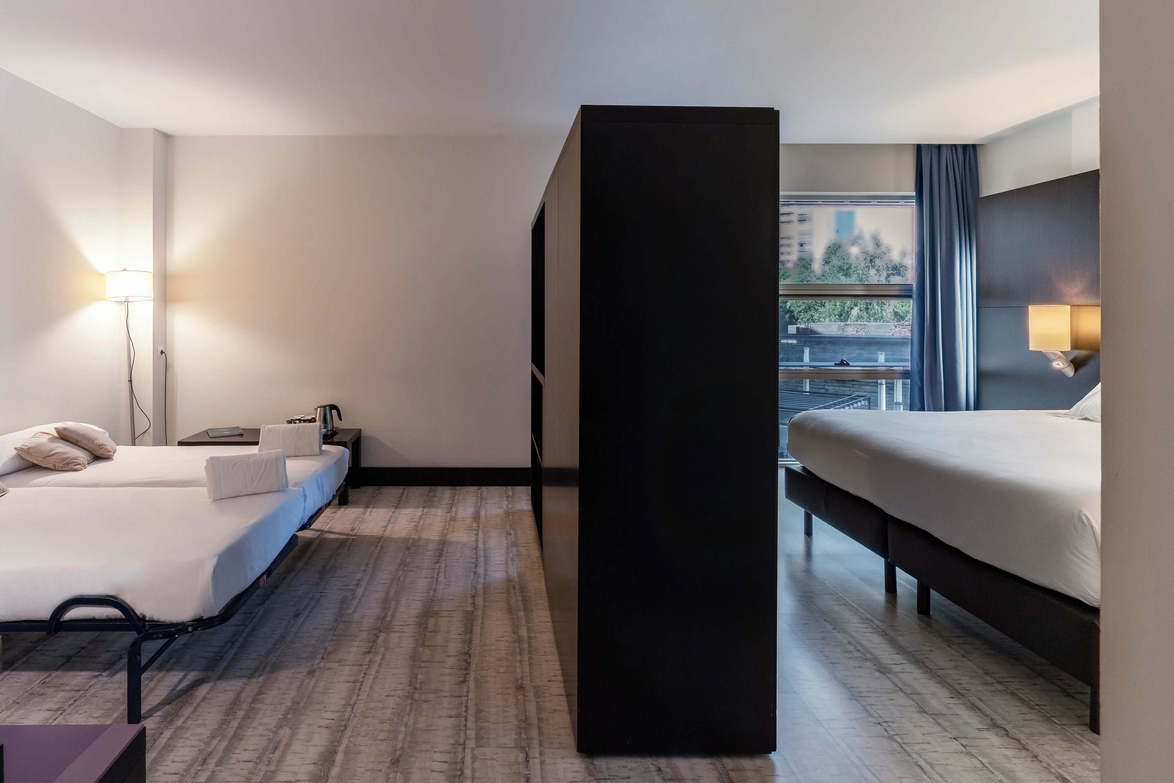 family room | premium bedding, down duvets, minibar, in-room safe