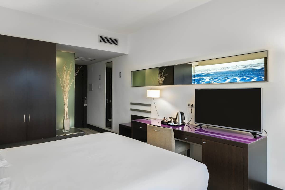 1 habitación, ropa de cama de alta calidad, cubrecamas y minibar
