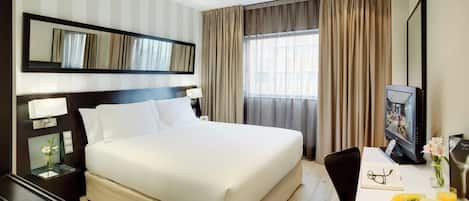 Memory-foam beds, minibar, in-room safe, desk