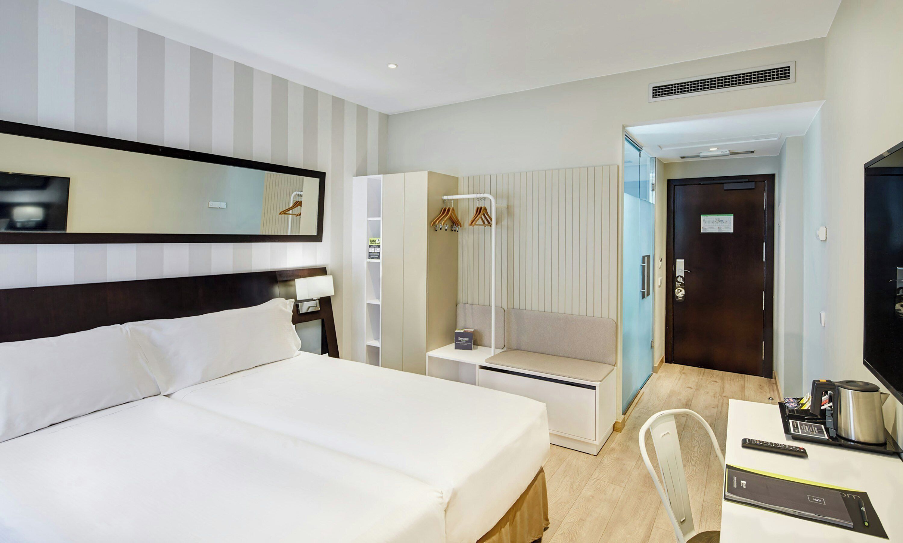 Memory-foam beds, minibar, in-room safe, desk