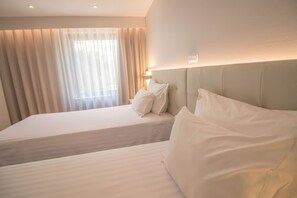 Standard Triple Room | 1 bedroom, down comforters, minibar, desk