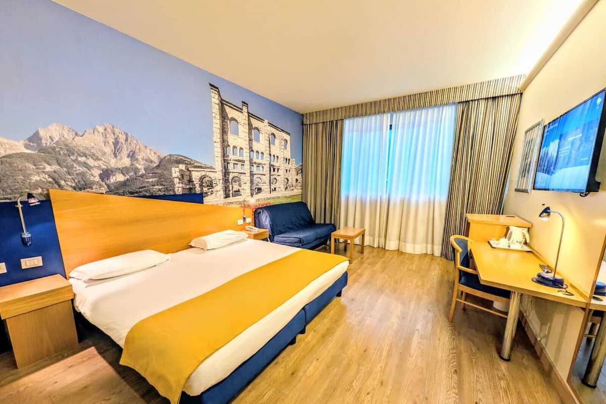 Minibar, desk, blackout drapes, iron/ironing board