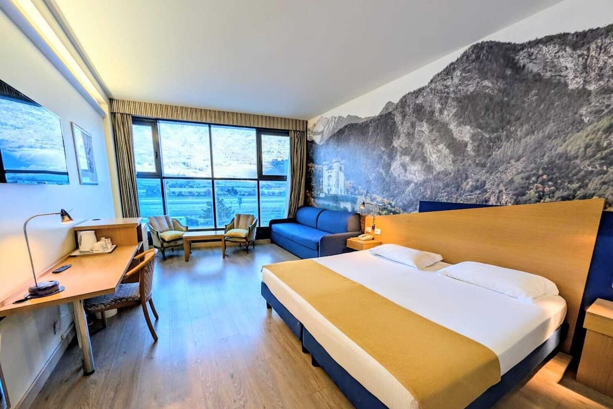 Deluxe Double or Twin Room | Minibar, desk, blackout drapes, iron/ironing board