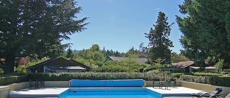 Seasonal outdoor pool, pool loungers