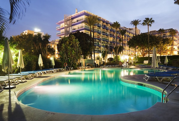 Indoor pool, outdoor pool, pool umbrellas, sun loungers