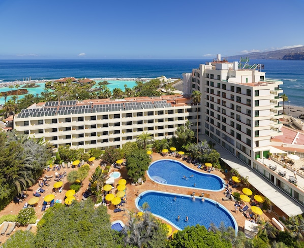 2 outdoor pools, open 9:00 AM to 6:00 PM, pool umbrellas, sun loungers