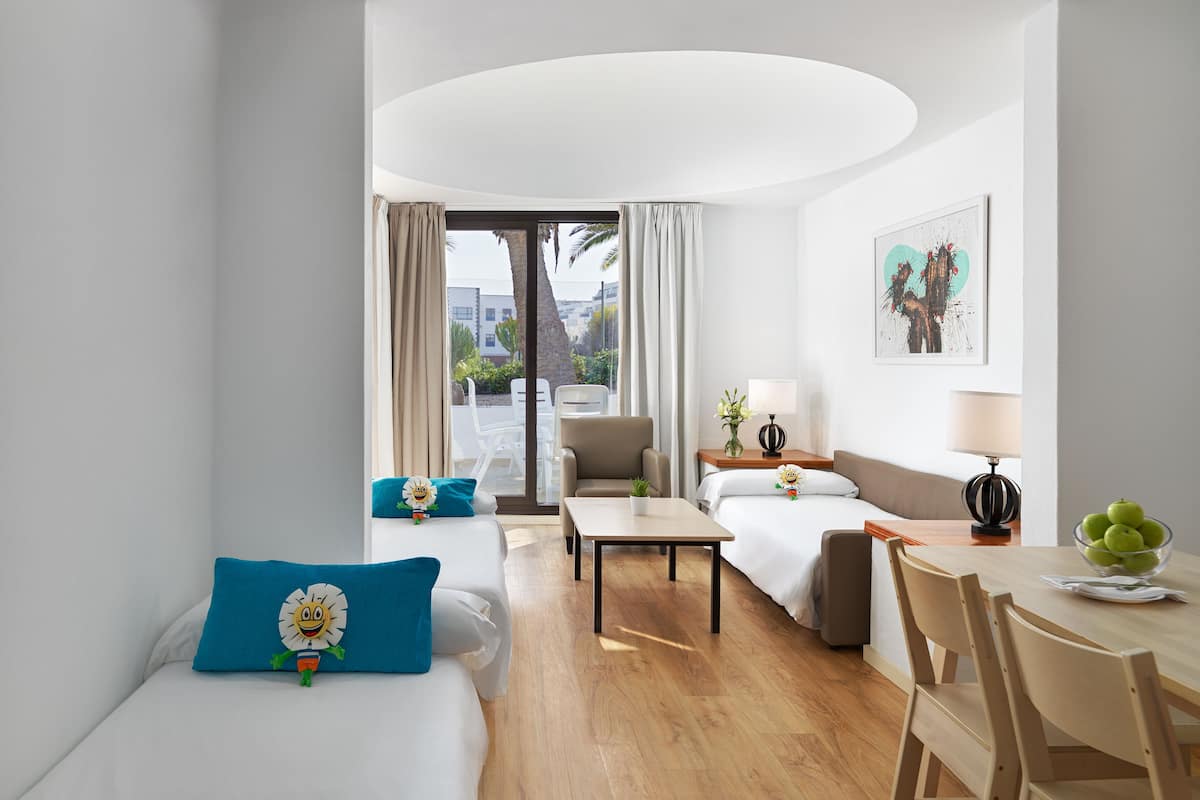 bungalow, 1 bedroom | living area | flat-screen tv