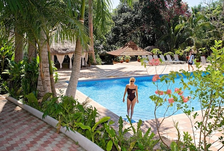3 outdoor pools, open 7:00 AM to 10:00 PM, pool umbrellas, sun loungers