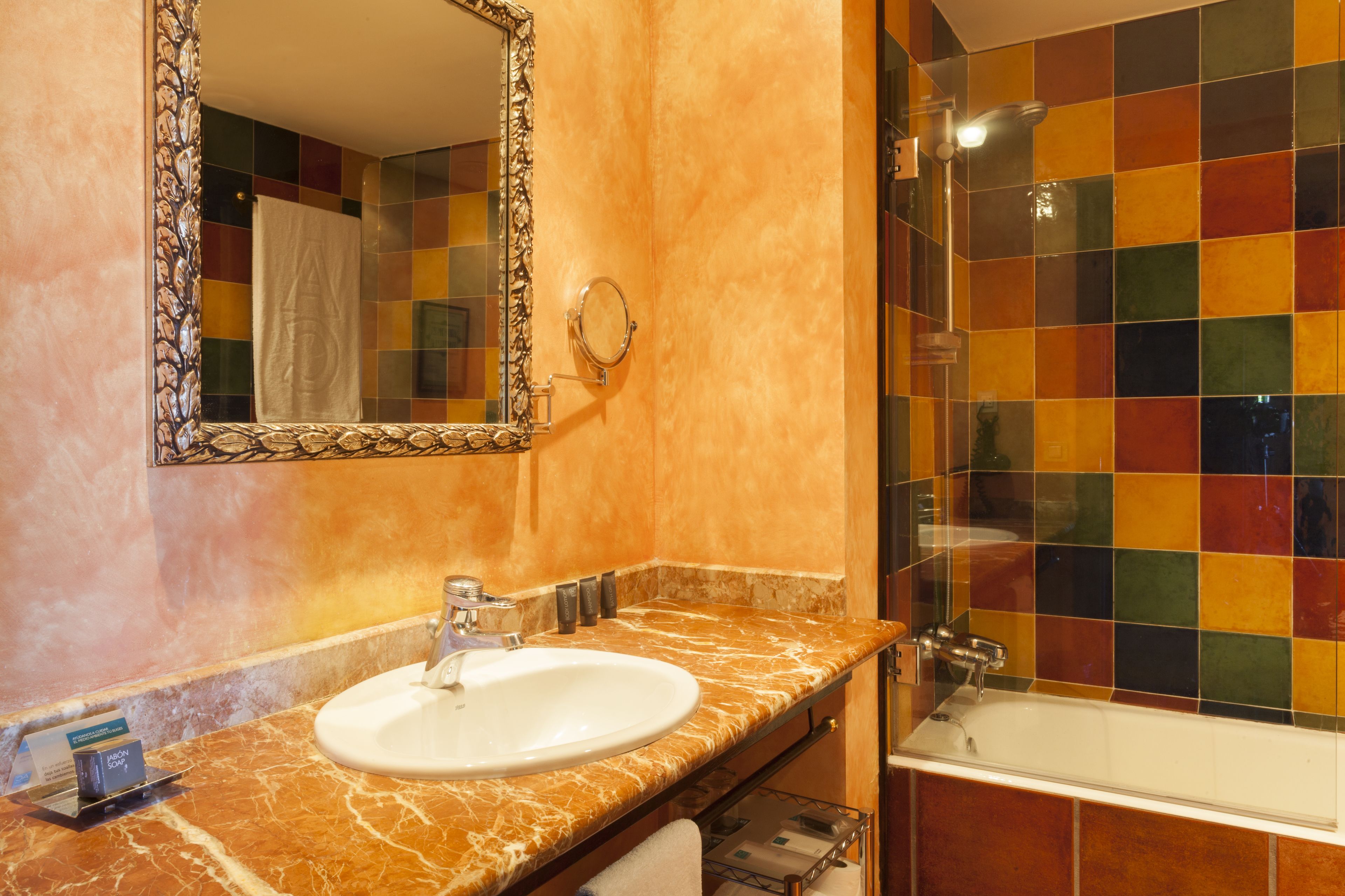 separate bathtub and shower, designer toiletries, hair dryer, bidet