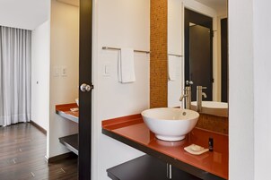 Shower, eco-friendly toiletries, hair dryer, towels