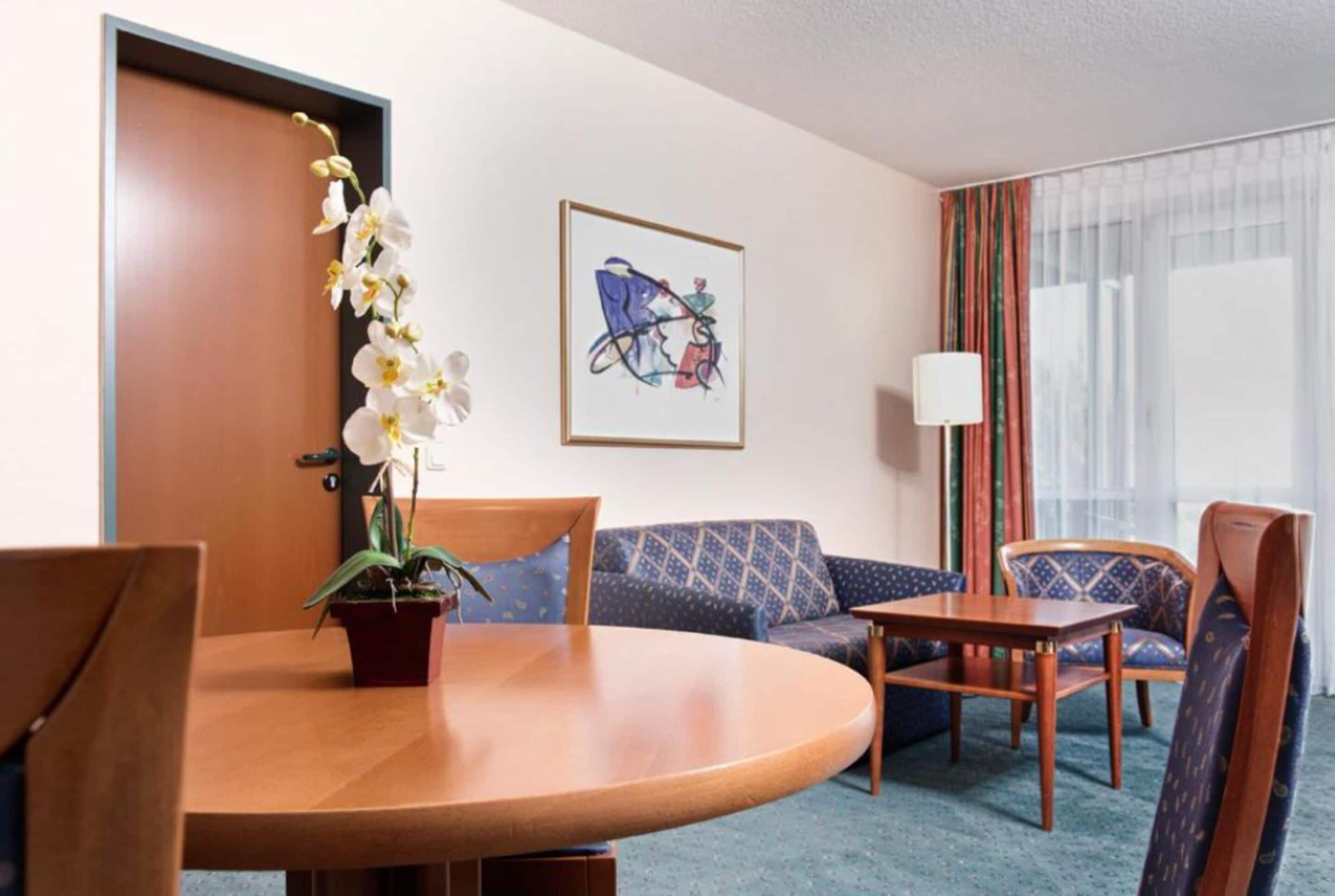 suite, 1 double bed with sofa bed, balcony (separate living area) | premium bedding, in-room safe, desk, laptop workspace