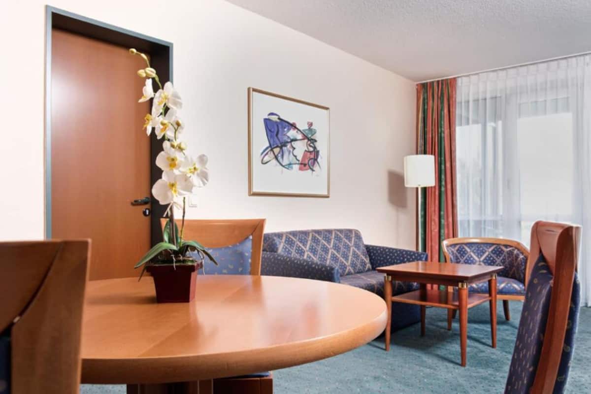 suite, 1 double bed with sofa bed, balcony (separate living area) | premium bedding, in-room safe, desk, laptop workspace