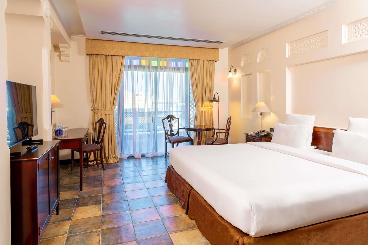 Deluxe Suite, 2 Bedrooms | Premium bedding, down comforters, minibar, in-room safe