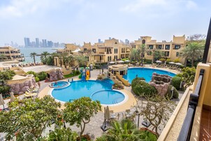 Outdoor pool, open 9:00 AM to 8:00 PM, pool umbrellas, sun loungers
