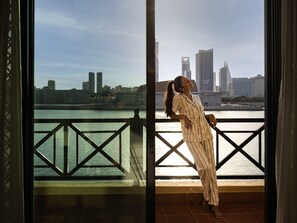 Premium bedding, down comforters, minibar, in-room safe