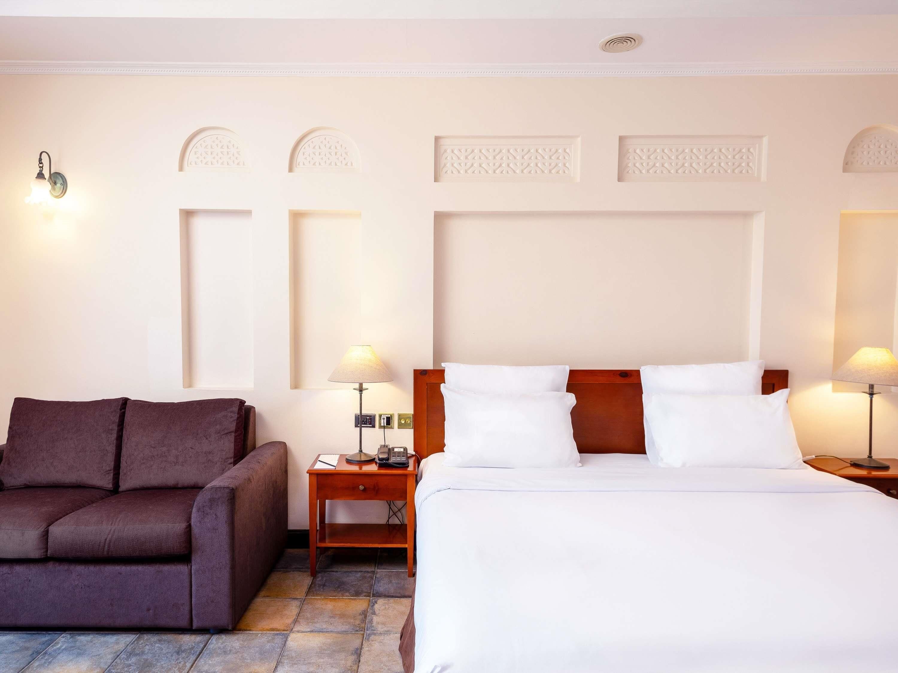 Premium bedding, down comforters, minibar, in-room safe