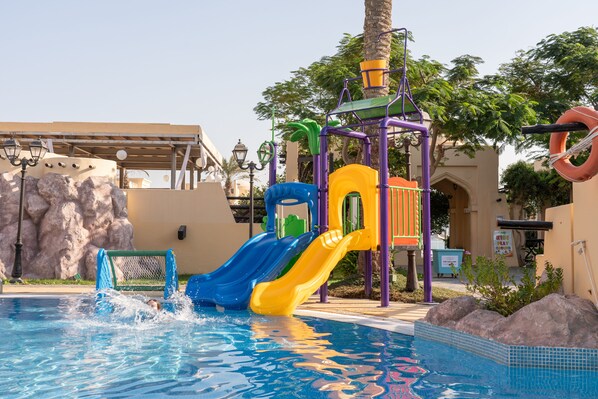 Outdoor pool, open 9:00 AM to 8:00 PM, pool umbrellas, pool loungers