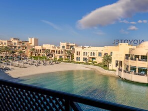 Deluxe Suite, 2 Bedrooms | Premium bedding, down comforters, minibar, in-room safe - Novotel Bahrain Al Dana Resort (Manama)
