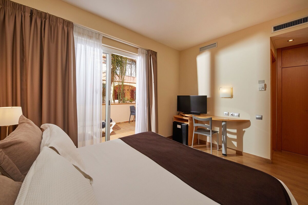 Hypoallergeen beddengoed, donsdekens, een minibar, een kluis op de kamer