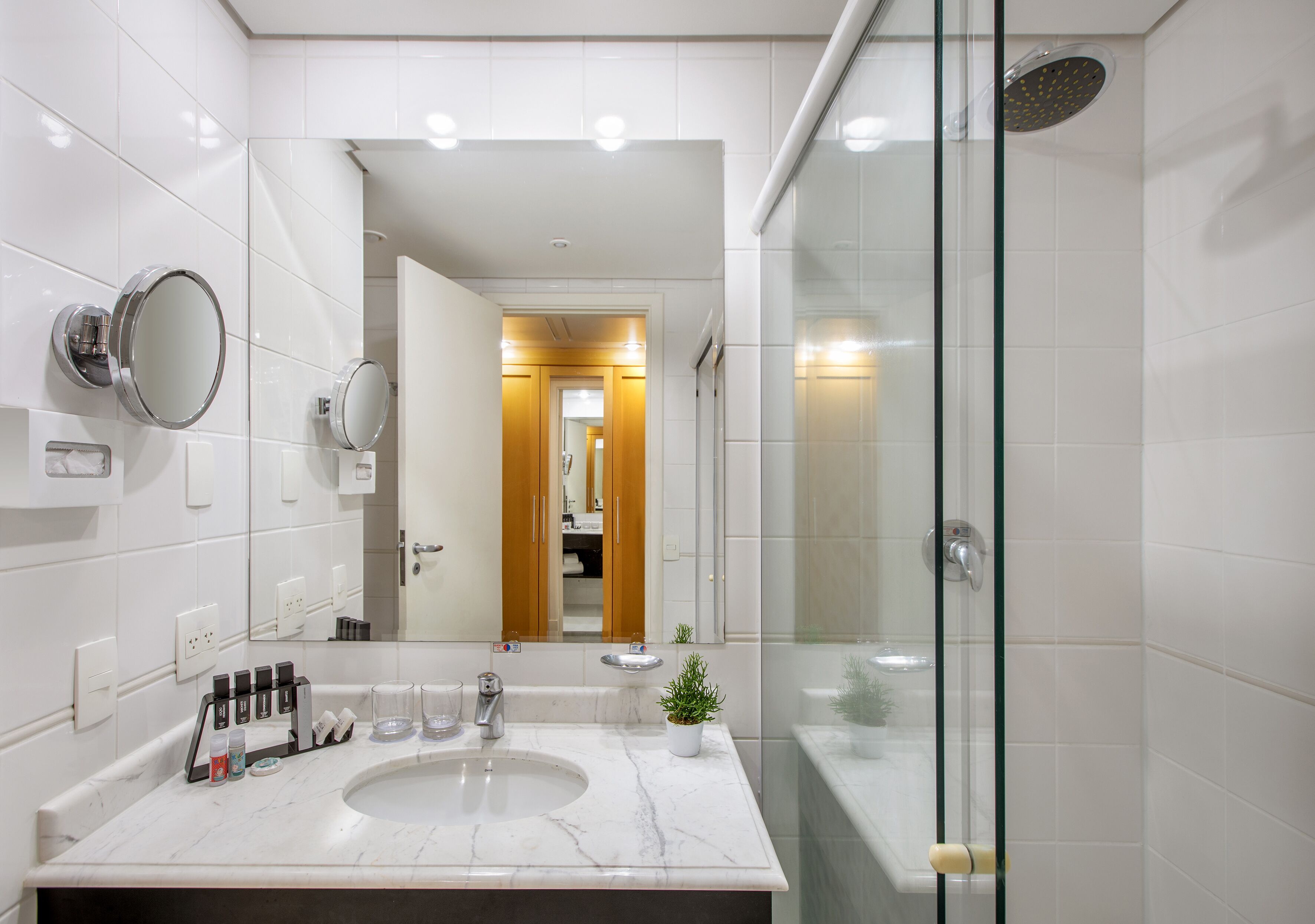 family room | bathroom | shower, rainfall showerhead, eco-friendly toiletries, hair dryer
