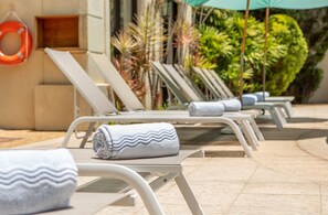 Outdoor pool, open 9:00 AM to 6:00 PM, sun loungers