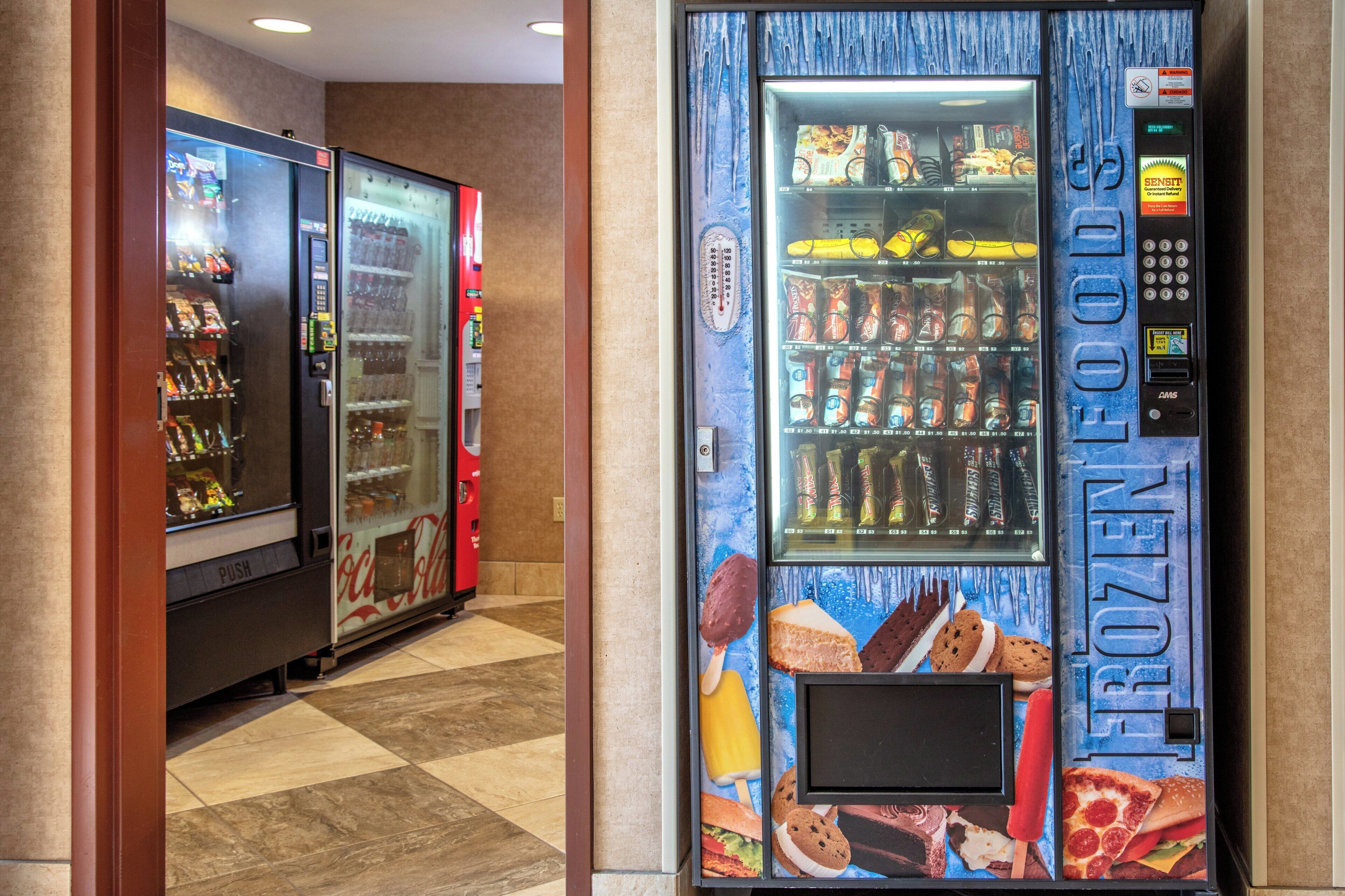 A vending machine with a variety of frozen food options.
