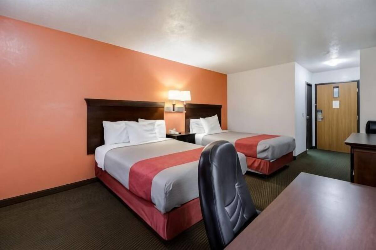 Desk, iron/ironing board, WiFi (free), alarm clocks