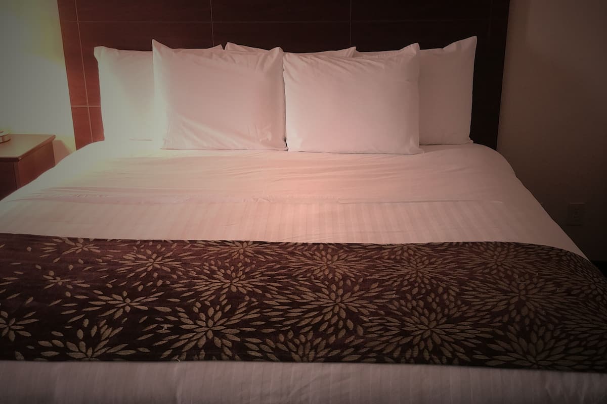 room, 1 king bed, non smoking | premium bedding, desk, laptop workspace, blackout curtains