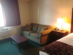 Suite, 1 King Bed with Sofa bed, Non Smoking | Living area