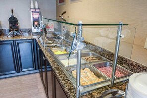 Free daily buffet breakfast  - Concord Suites (Concord)