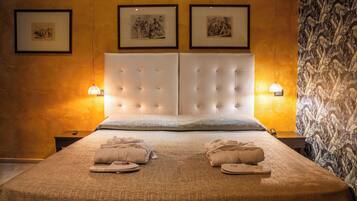 Junior suite, 1 tweepersoonsbed | Donsdekens, een minibar, een kluis op de kamer, individueel gemeubileerd