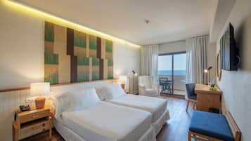 Ropa de cama de alta calidad, edredones de plumas, minibar y escritorio