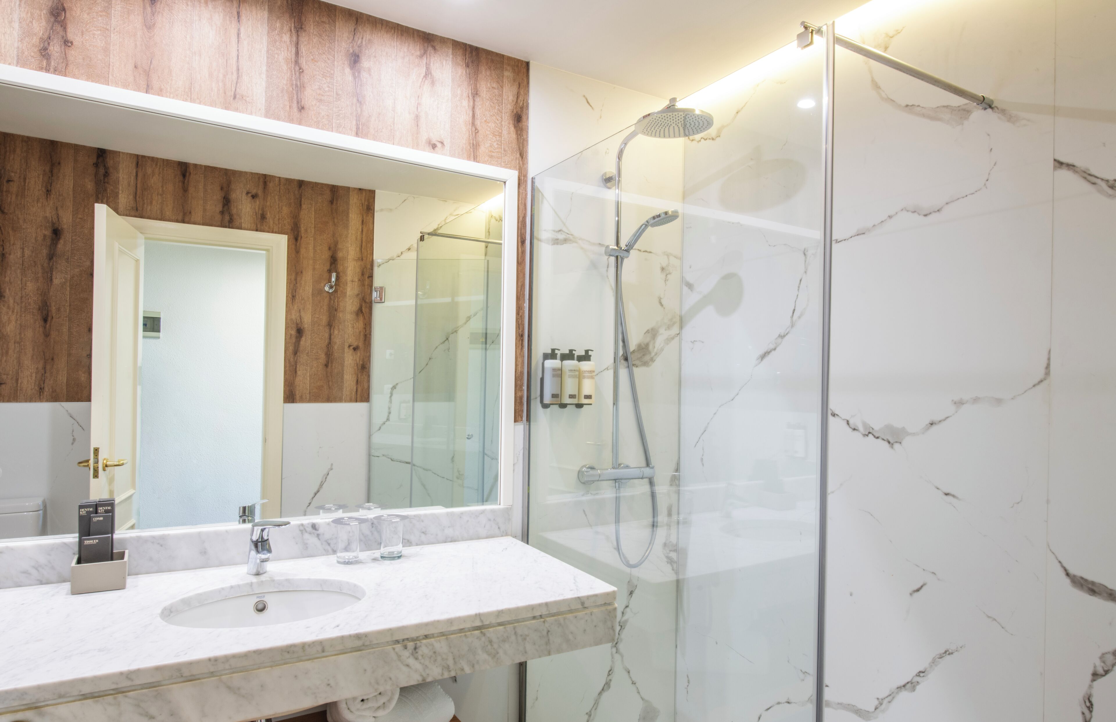 eco-friendly toiletries, hair dryer, towels, soap