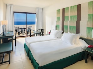 Premium bedding, down comforters, minibar, desk