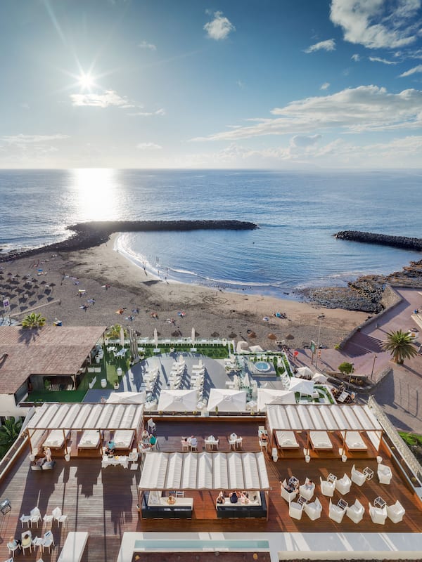 On the beach, black sand