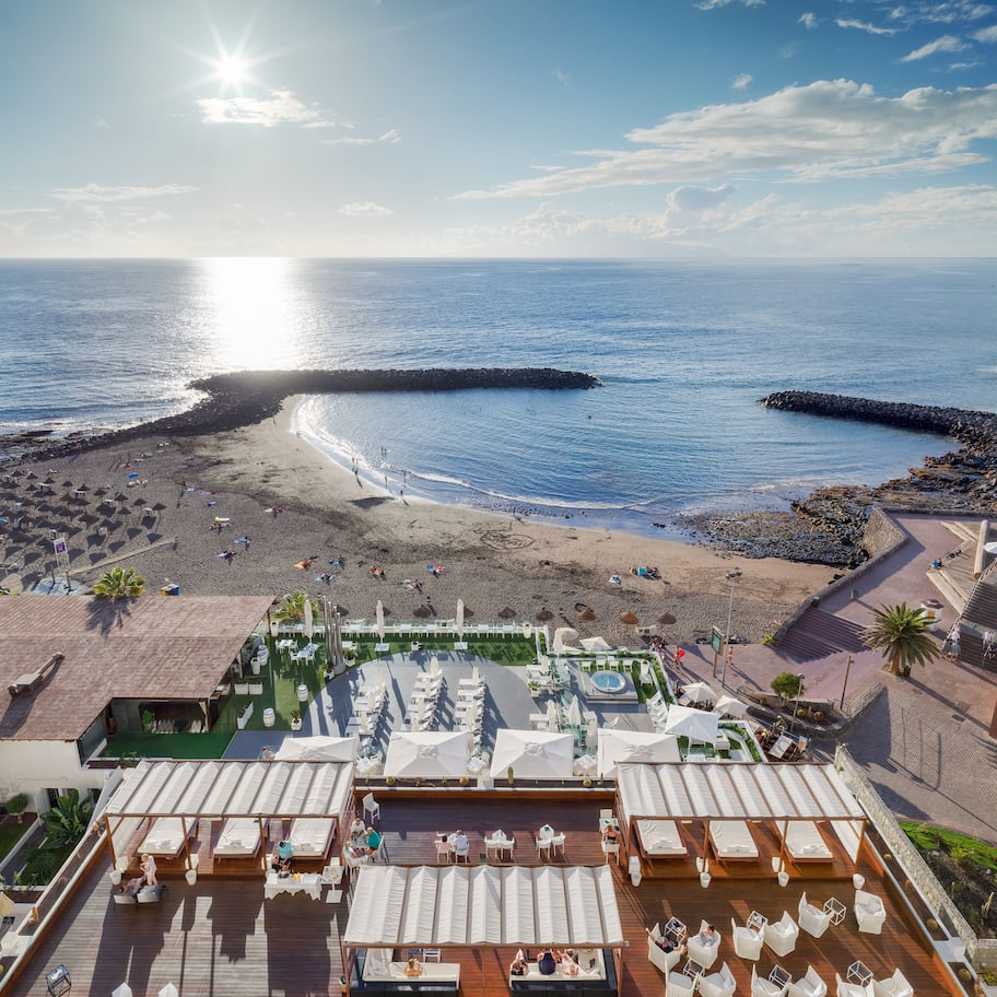 On the beach, black sand