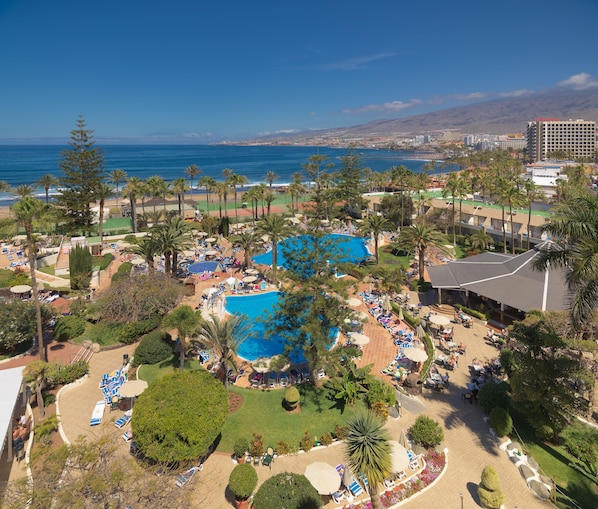 2 outdoor pools, pool umbrellas, pool loungers