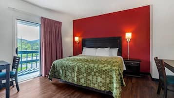 Standard Room, 1 King Bed | Desk, iron/ironing board, free cribs/infant beds, rollaway beds