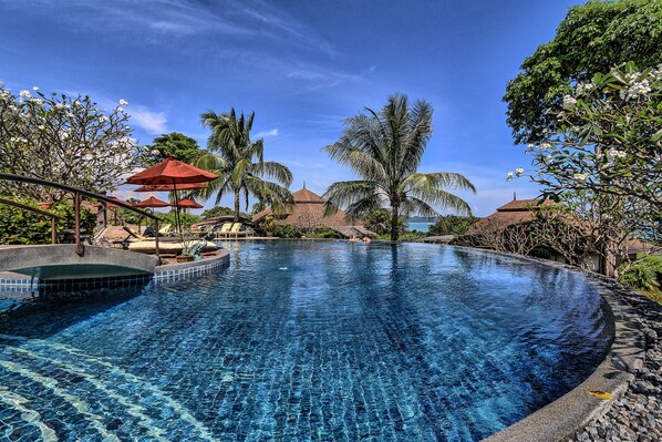 Outdoor pool, pool umbrellas, pool loungers