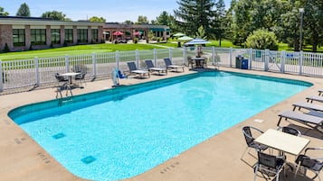 Indoor pool, open 8:00 AM to 9:00 PM, pool umbrellas, pool loungers