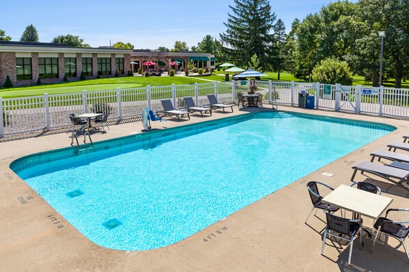 Indoor pool, open 8:00 AM to 9:00 PM, pool umbrellas, pool loungers