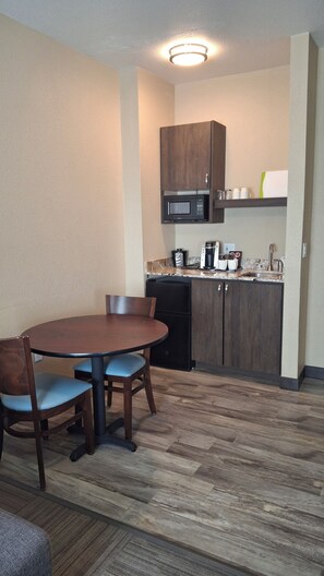 Mini-fridge, microwave, stovetop, coffee/tea maker
