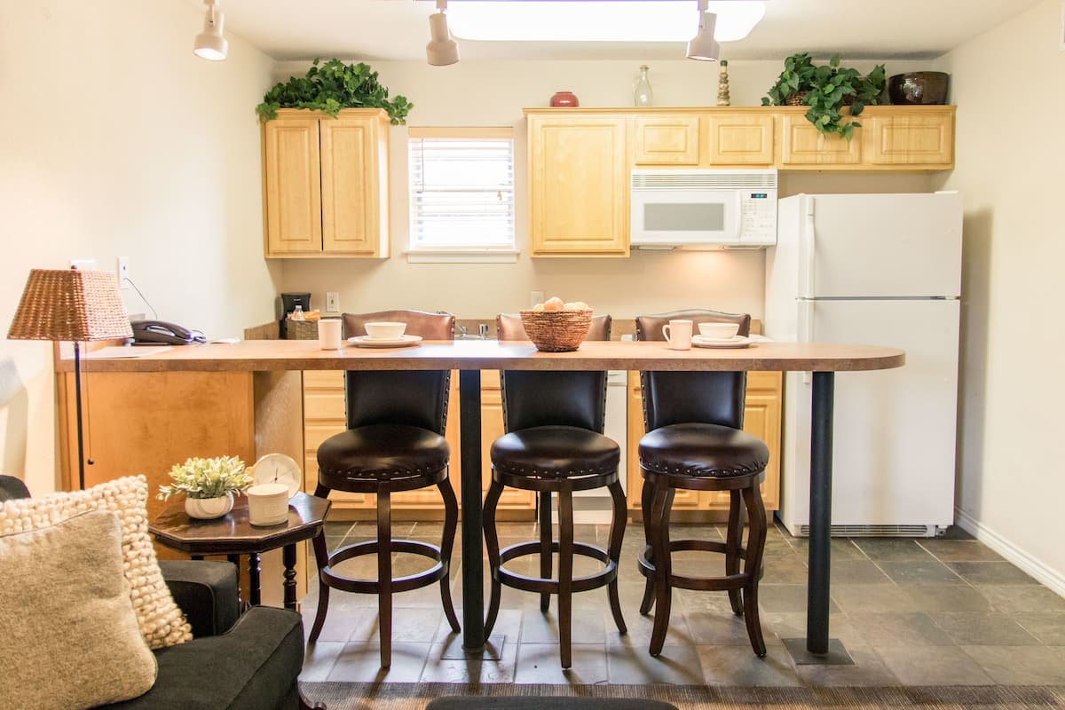 full-sized fridge, microwave, stovetop, dishwasher