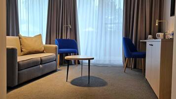 Executive Double Room, 2 Twin Beds | Living area | LED TV