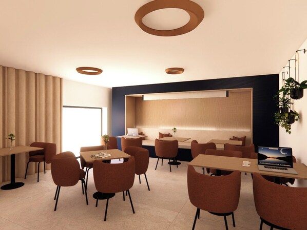 A modern hotel lobby with a seating area, a reception desk, and a large wall-mounted screen. - Hotel Les 3 Clés (Gembloux)