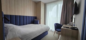 Habitación individual estándar | Ropa de cama de alta calidad, minibar, caja fuerte
