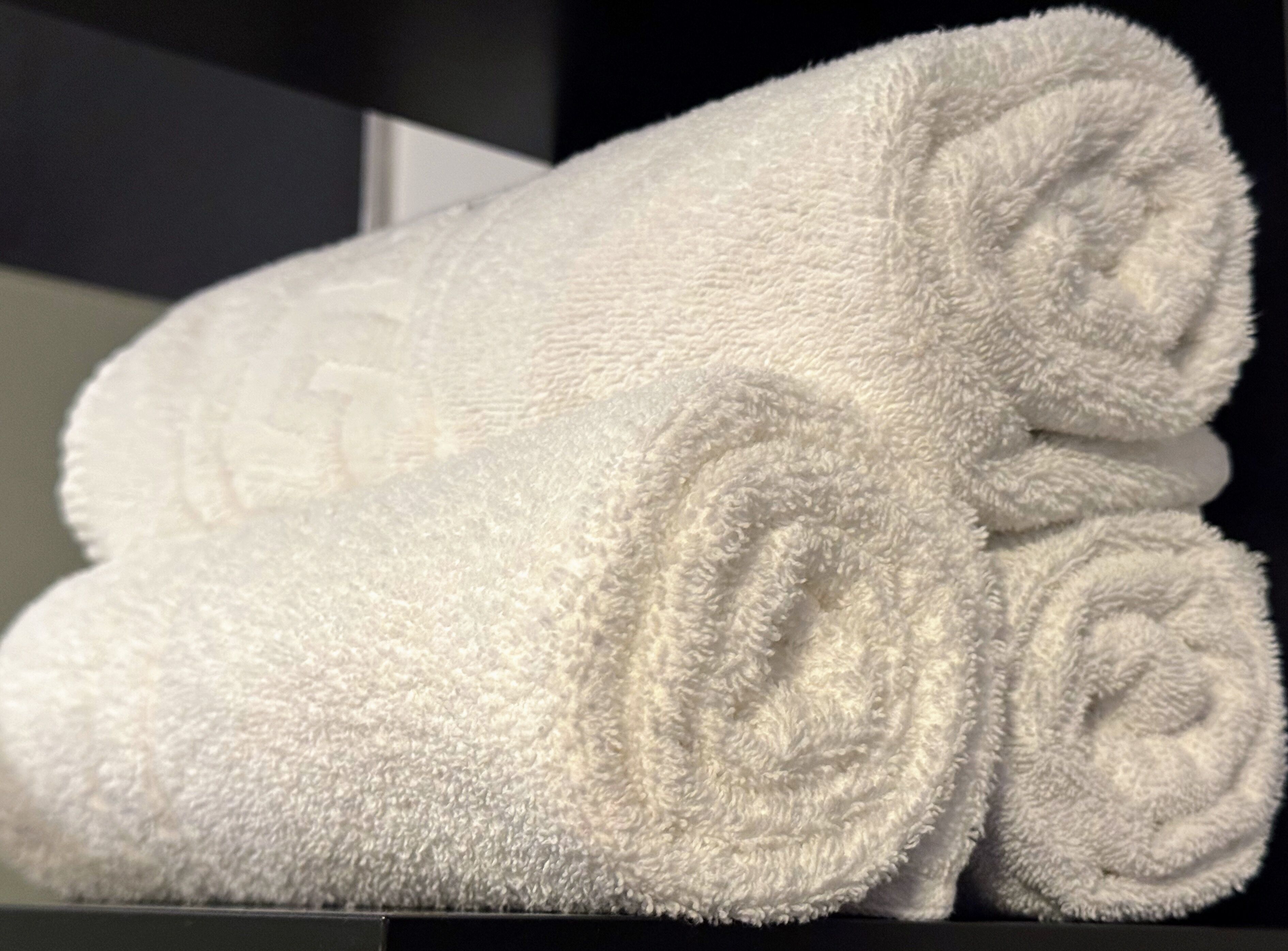 A rolled white towel.