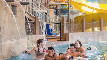 Enjoy splashing fun in our indoor water park with a climbing wall and water slide.